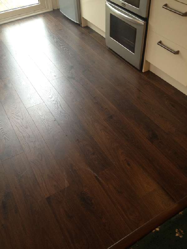 Right Renovations - Dark stained hardwood floor